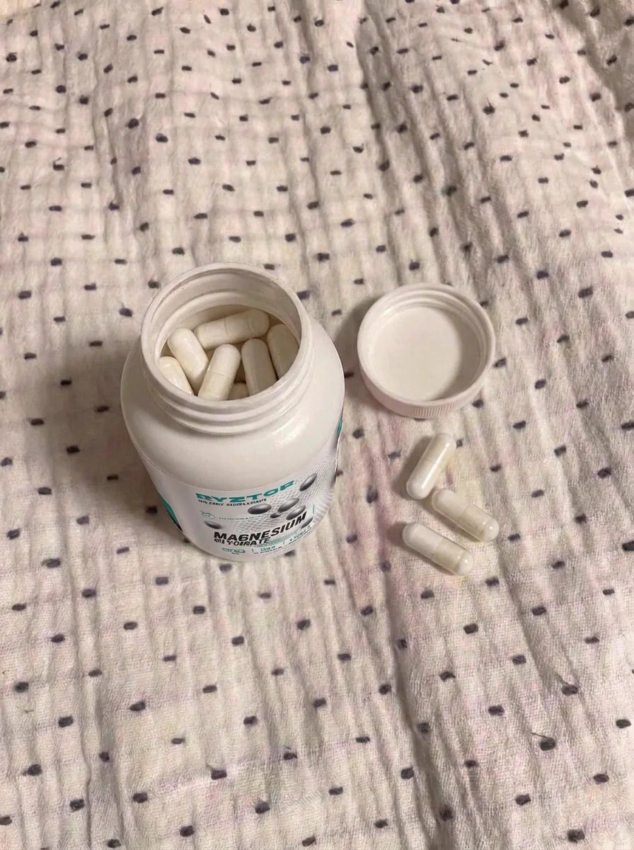 Open bottle of Magnesium Glycinate